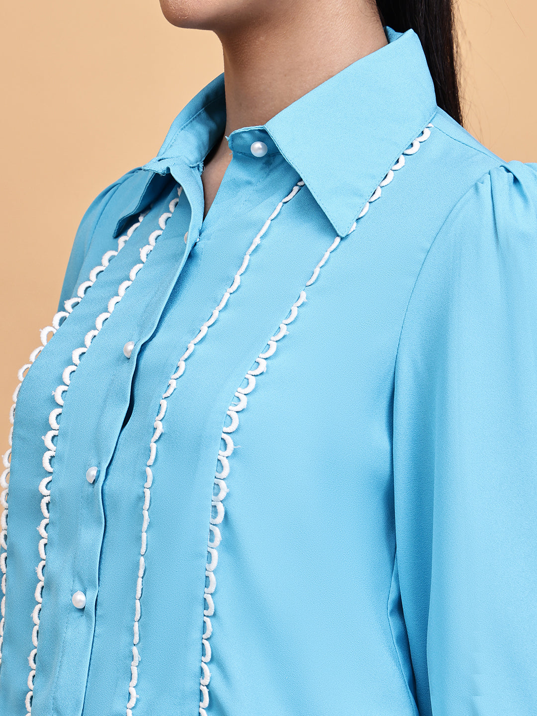 Deep cyan blue shirt with loop detail
